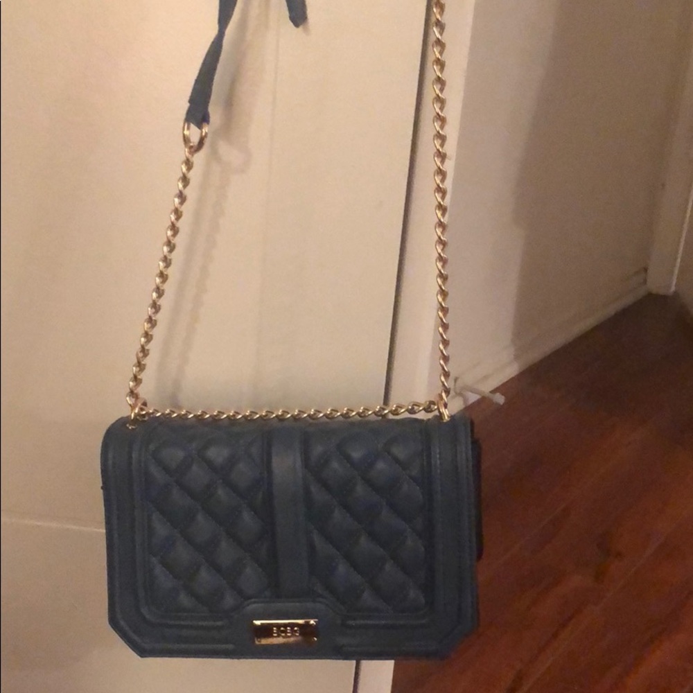 Super cute bang bag. Only worn once.